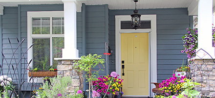 Close up of house with yellow front door